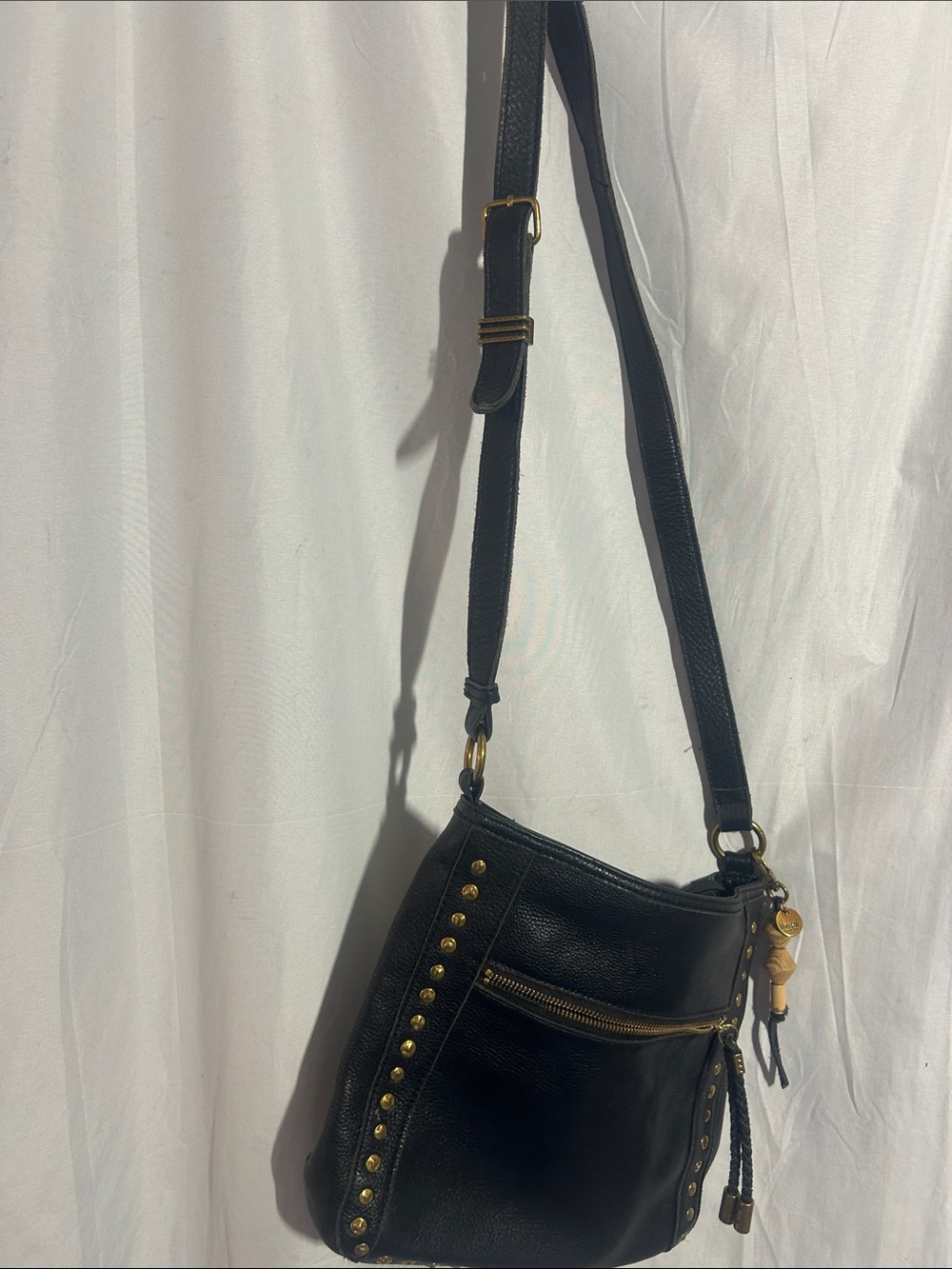 The Sak Black Leather Crossbody with Gold Stud Accents